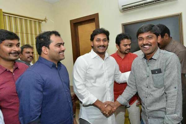 File Pic : Y S Jagan with Ravindra Ippala ( Left - Blue shirt )