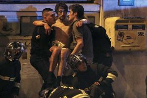 At least 120 dead in Paris attacks, Hollande declares emergency