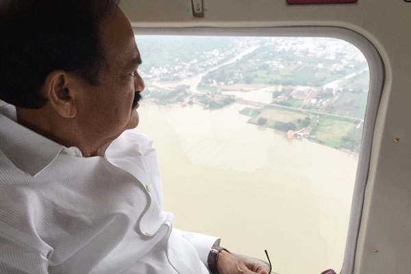 Venkaiah conducts aerial survey of flood-hit Andhra district