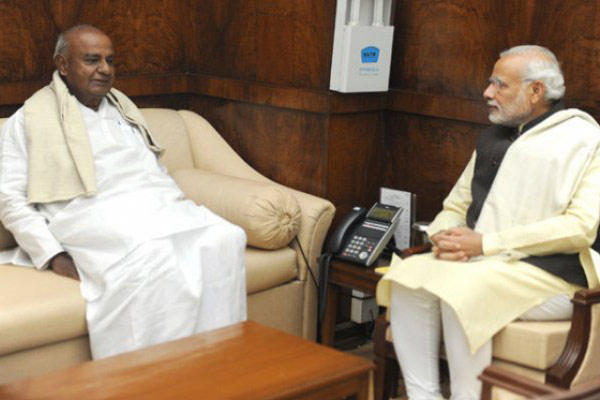 Newly blossomed love between Deve Gowda and Modi