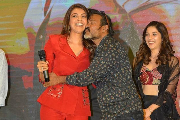 Chota K Naidu kisses Kajal Aggarwal at Kavacham Teaser event