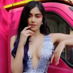 Adah Sharma's cleavage show in a Newspaper printed wear Adah Sharma's cleavage show in a Newspaper printed wear