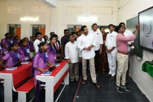Jagan spends time with students in classroom