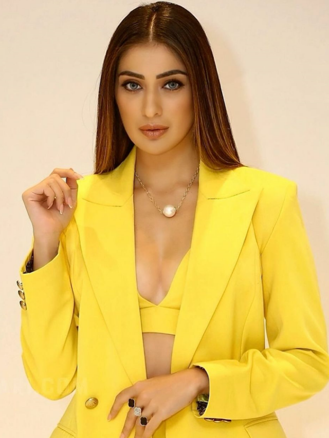 Raai Laxmi Looking Hot In Yellow Dress